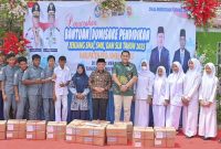 Foto : Penyerahan Bantuan Dumisake di Kabupaten Merangin Oleh Gubernur Al Haris (Dok Kominfo)