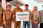 Foto ; Penyerahan Bantuan Obat - Obatan Oleh PT Kerinci Merangin Hydro (KMH)