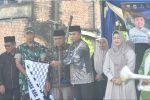 Foto : Wakil Bupati Muaro Jambi Junaidi Mahir Lepas Pawai Ta'aruf dan Kendaraan Hias (Sumber : Humas)