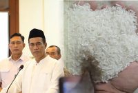 Foto : Kolase Menteri Amran Sulaiman dan Beras ( Sumber Tribunnews.com)
